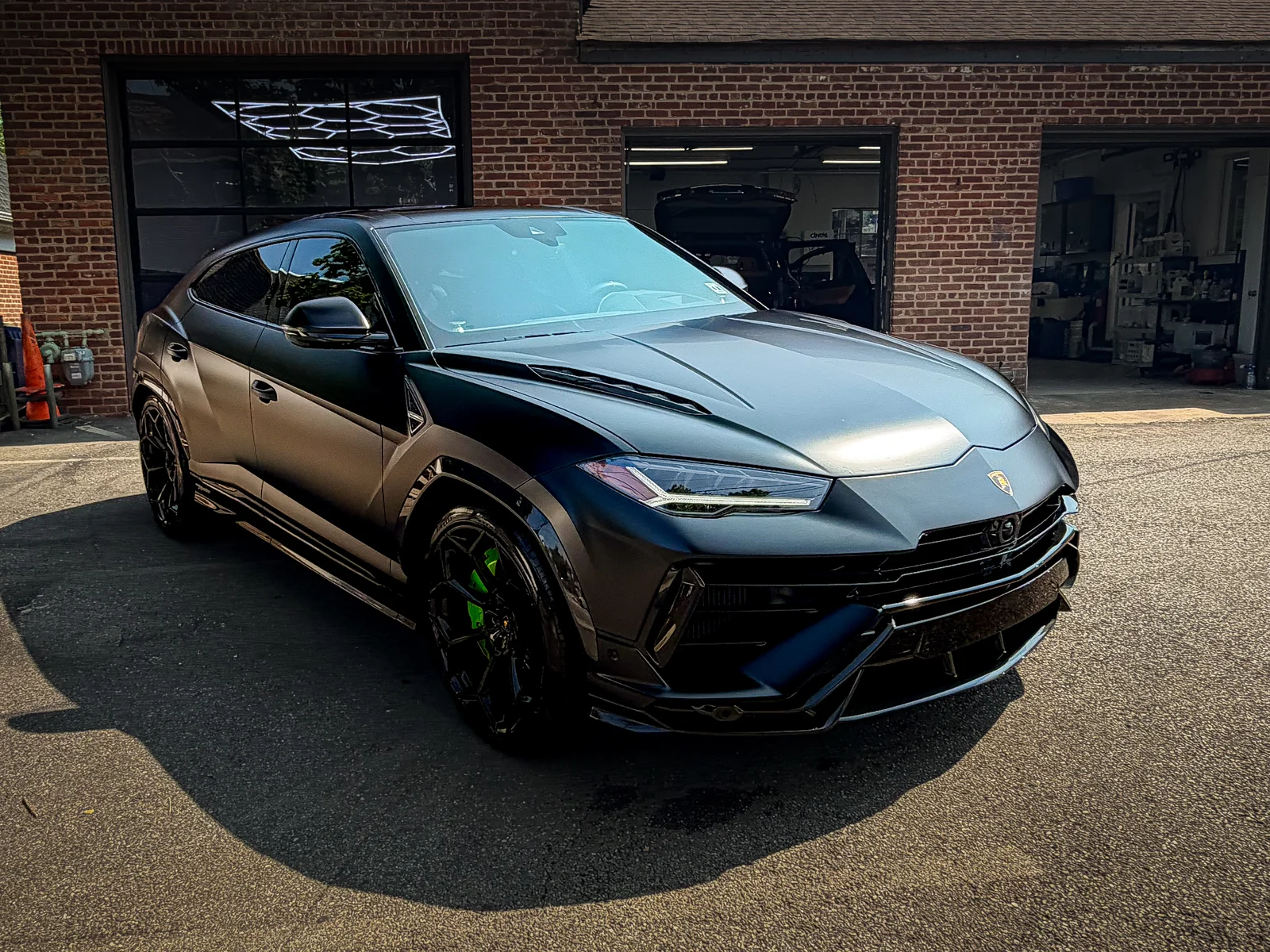Lamborghini Urus in satin matte black with ceramic coating outside CleanWorx Basking Ridge shop